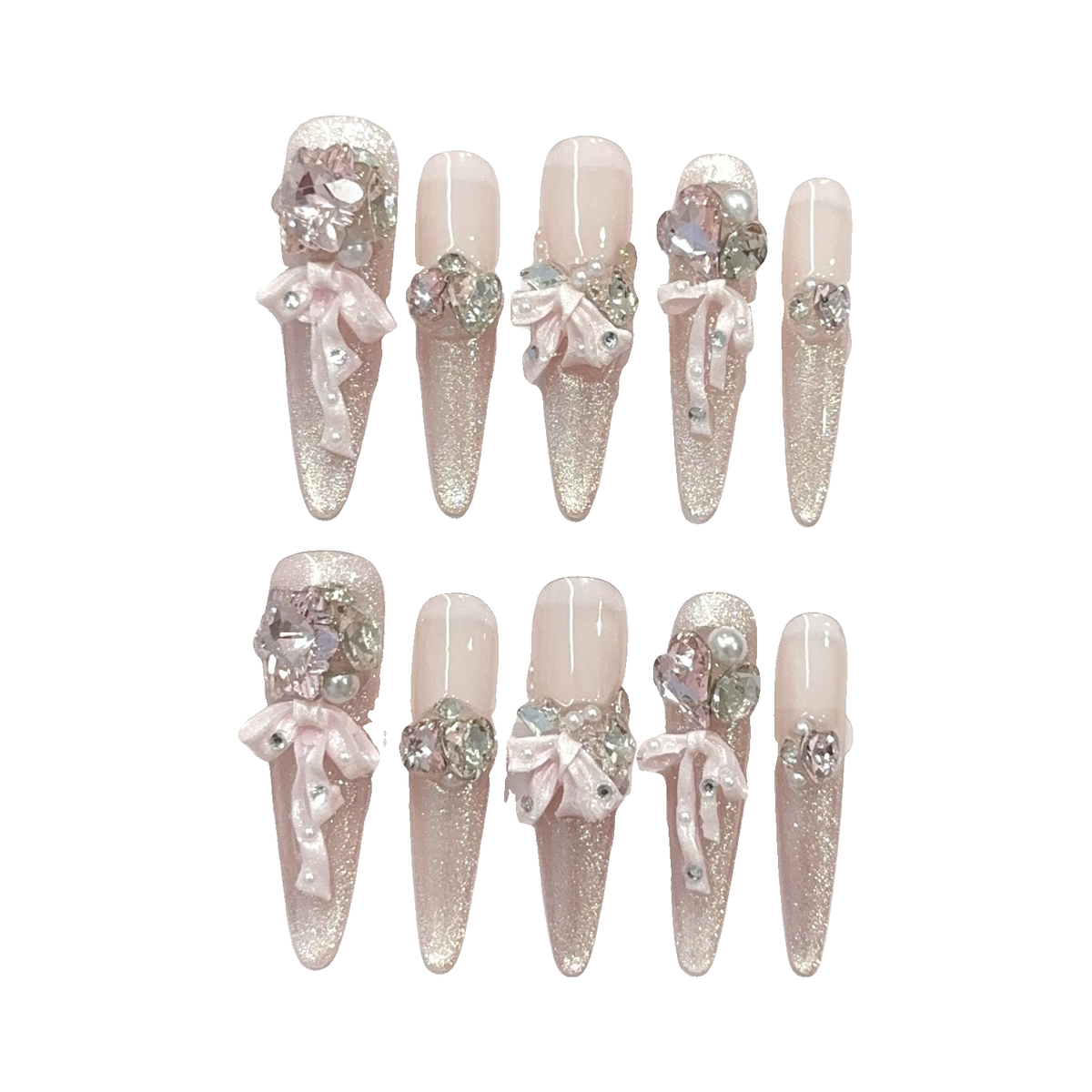 Pink cat eye long stiletto press-on nails with sculpted bows and rhinestones, 10-piece set on a white background